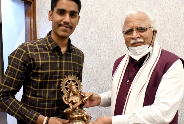 Haryana CM Manohar Lal meets CBSE 12th class topper Hiteshwar Sharma