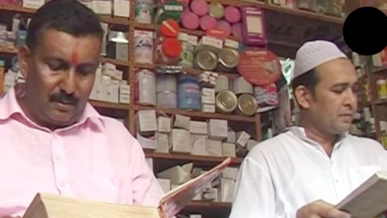 Salim-Achal sit together and read Quran and Gita