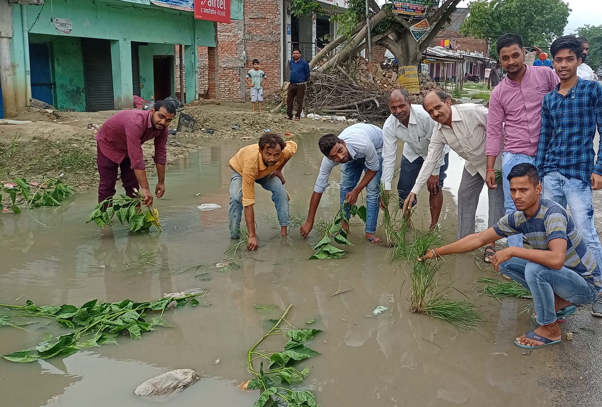 Expressed protest against the water accumulated on the side of the road