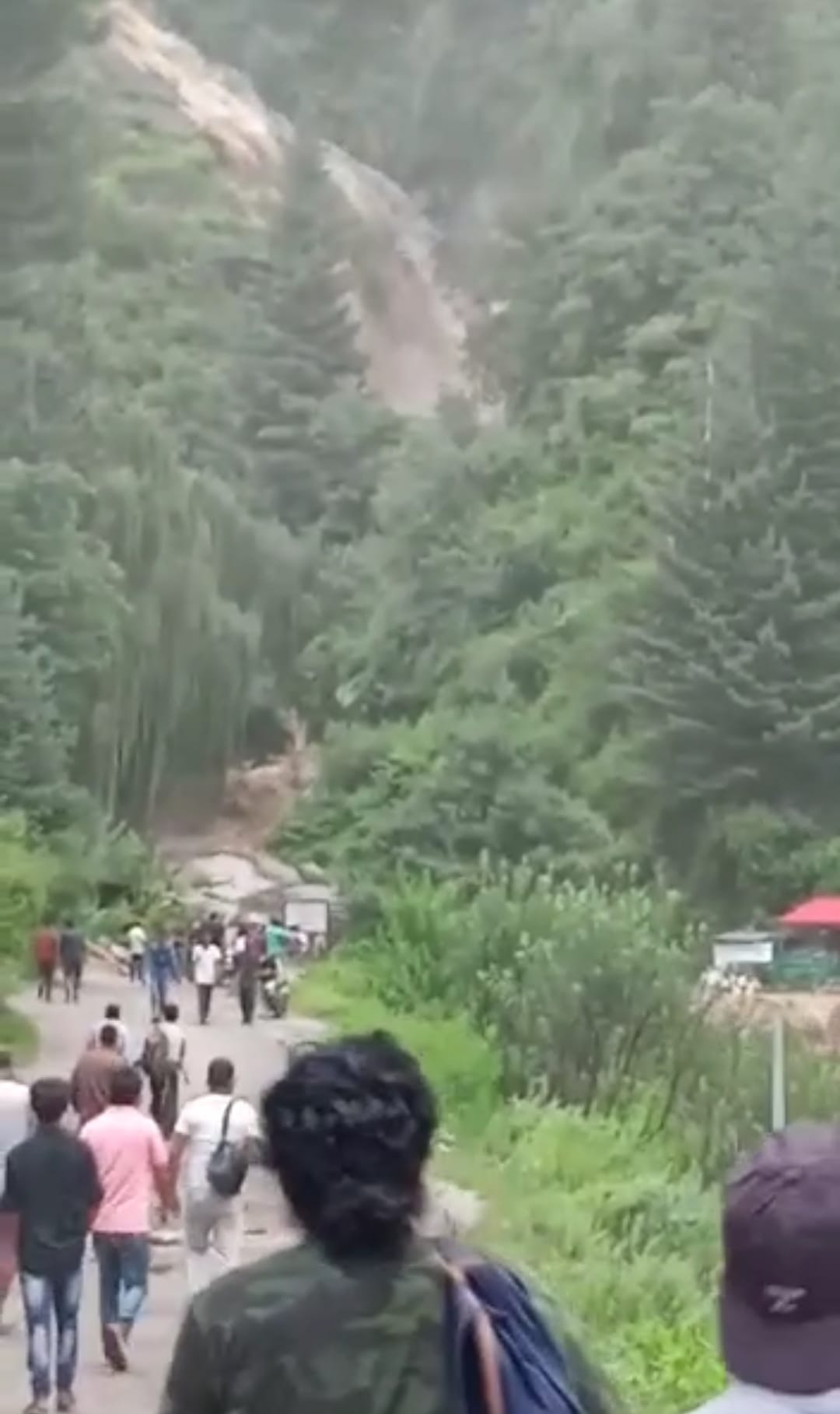 People scared of rising water level of the drain, ran to save their lives