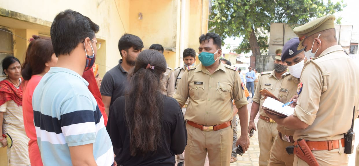Entering the Collectorate Colony, attacking the woman with a sharp weapon