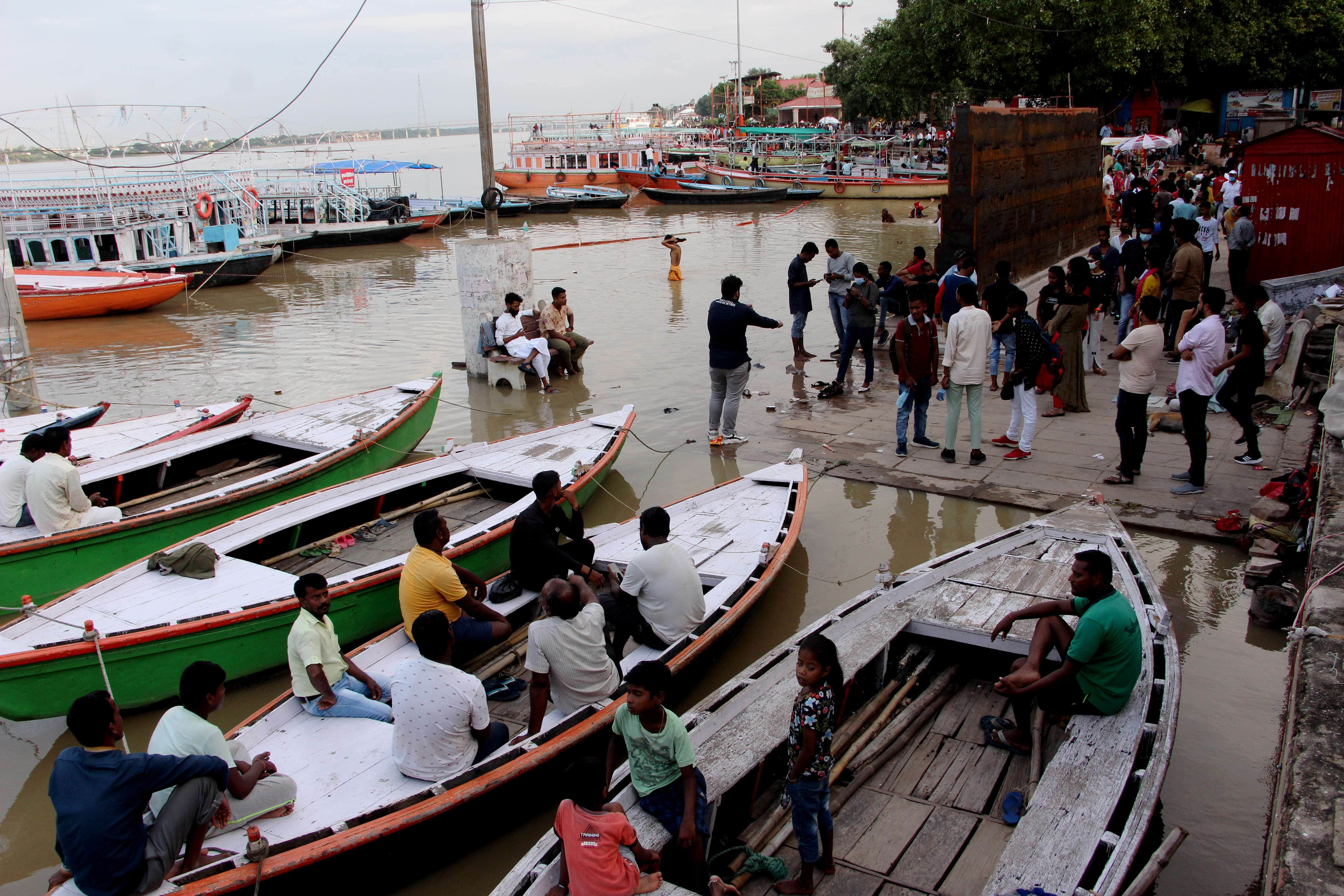 Waiting for nine hours for salvation at Manikarnika, the crematorium on the roofs due to rising Ganga water level in Varanasi