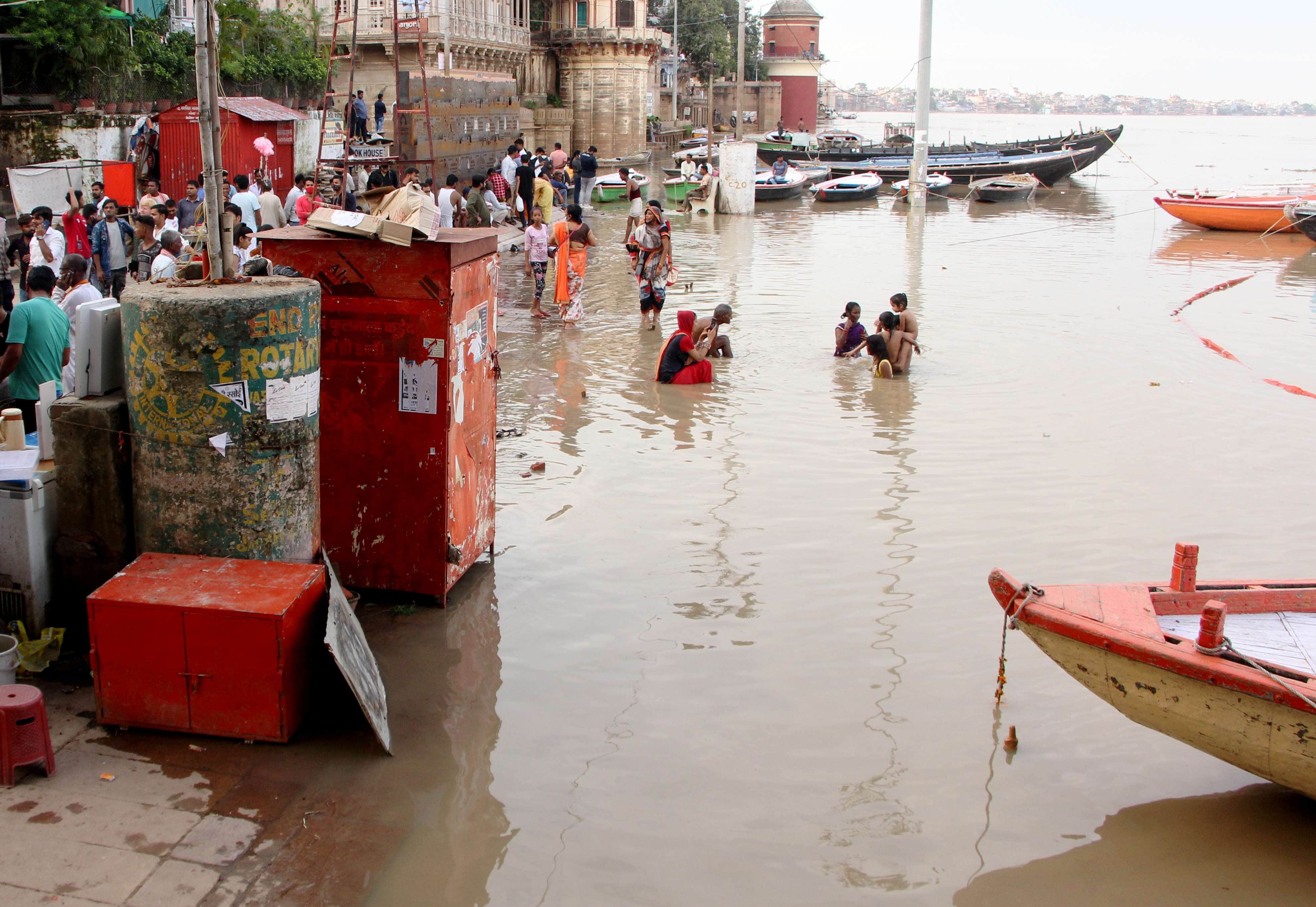 Waiting for nine hours for salvation at Manikarnika, the crematorium on the roofs due to rising Ganga water level in Varanasi