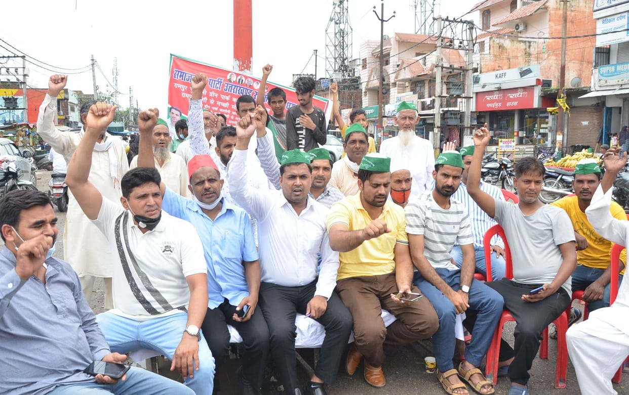 Anger against broken roads and waterlogging