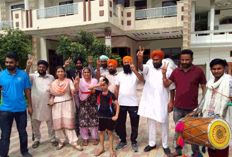 People distributed Laddu at village of hockey player Simranjit Singh On victory of Indian team
