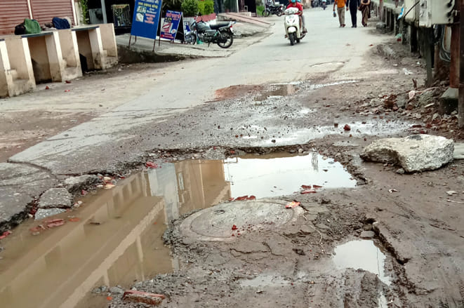 Broken sewer cover in smart city, manholes open