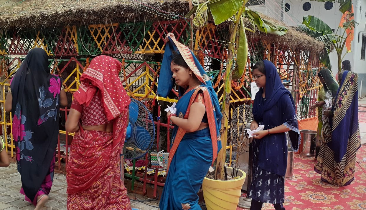 Devotees circumambulate the Yagya Mandap