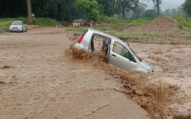 Car got stuck in Panod drain due to strong current