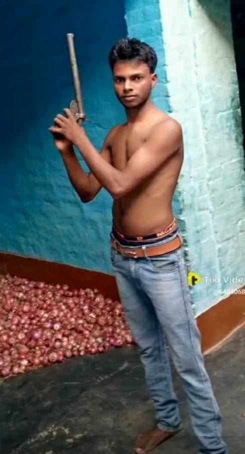Photo of young man waving firearm goes viral