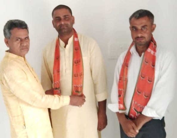 BJP district president reinstated two suspended workers