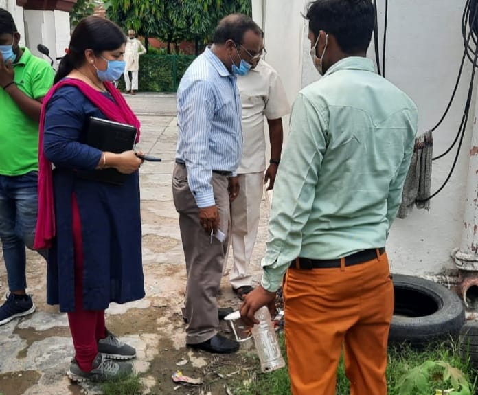 Inspection of government offices in search of mosquito larvae