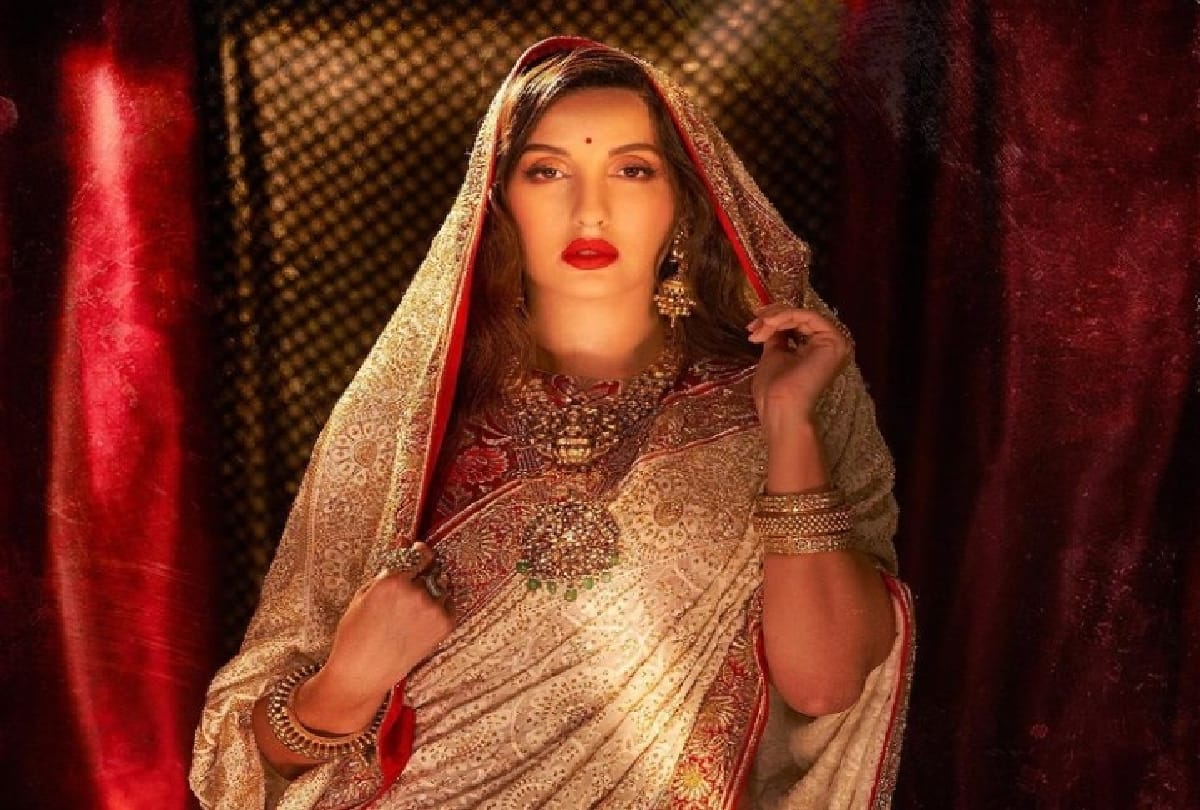 Nora Fatehi is looking very beautiful in Traditional beige chikankari saree see pics