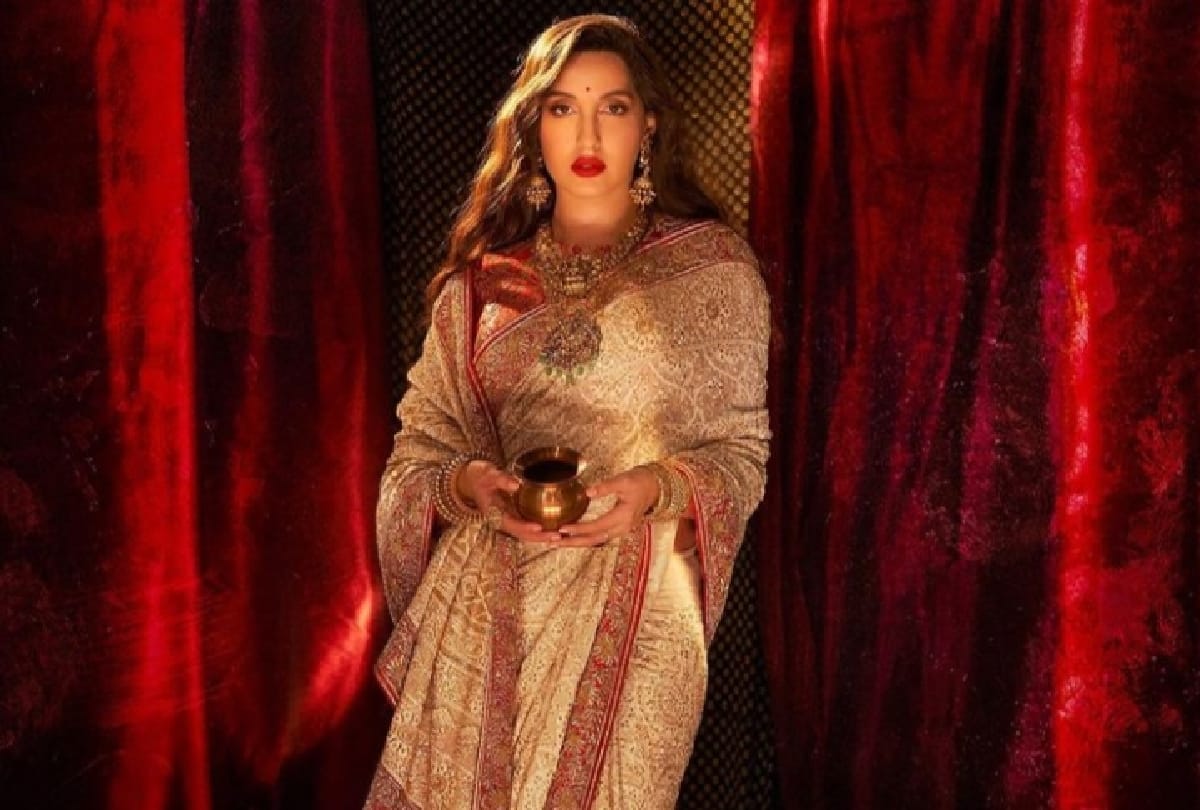 Nora Fatehi is looking very beautiful in Traditional beige chikankari saree see pics