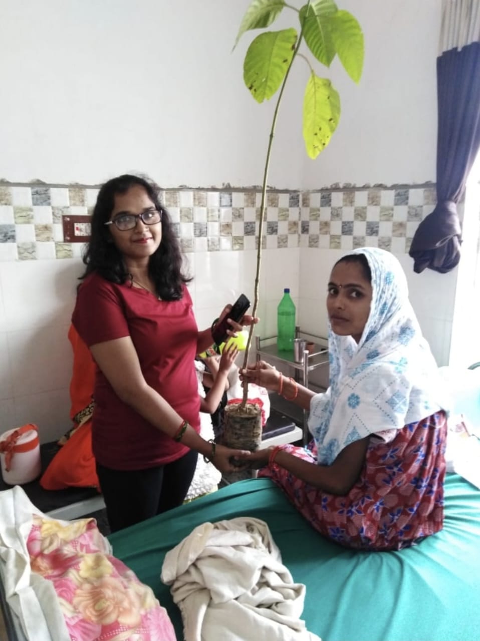 etawah news,Offering a plant to a woman after the birth of a child