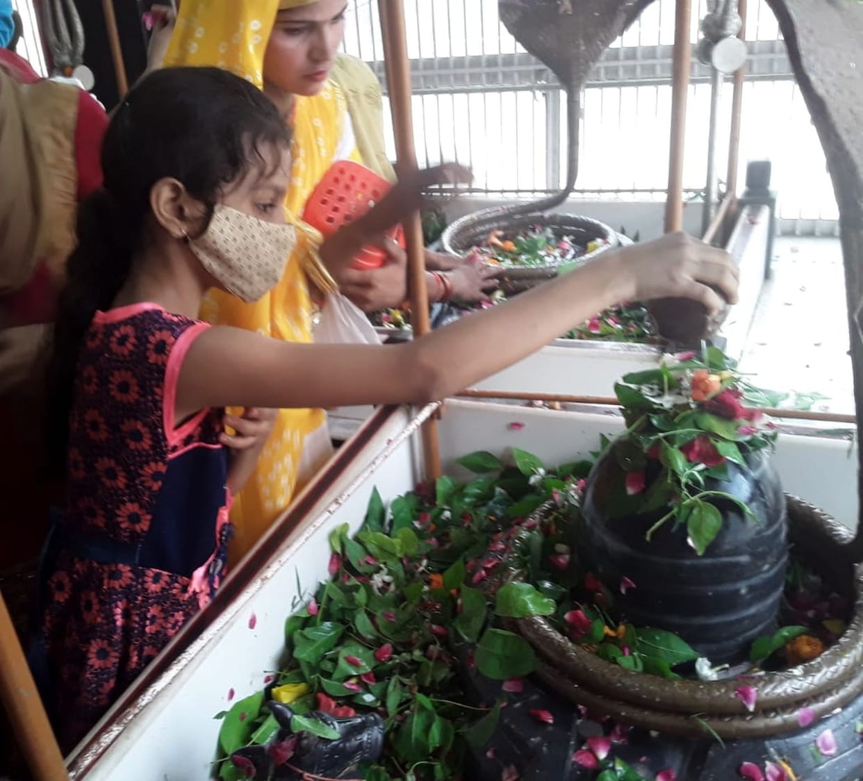 The pagoda reverberated with cheers, Bhole was anointed