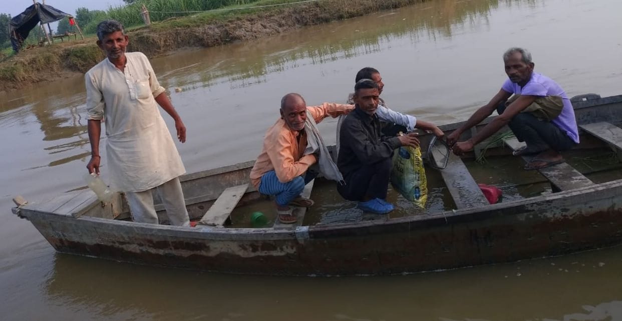 Boat support for crossing Solani river in Purkaji Khadar area