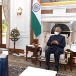 राष्ट्रपति कोविंद से चर्चा करते सीजेआई एनवी रमण