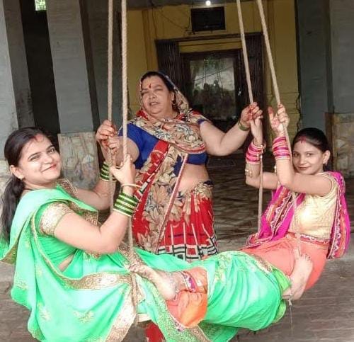 Women dance on the songs of Shravan