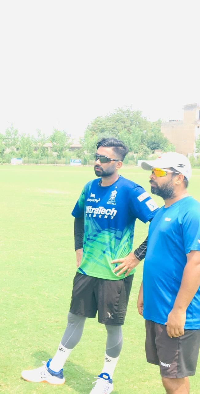 Aniket of Basti giving education of cricket in Haryana