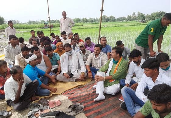 Villagers sitting on dharna for road construction