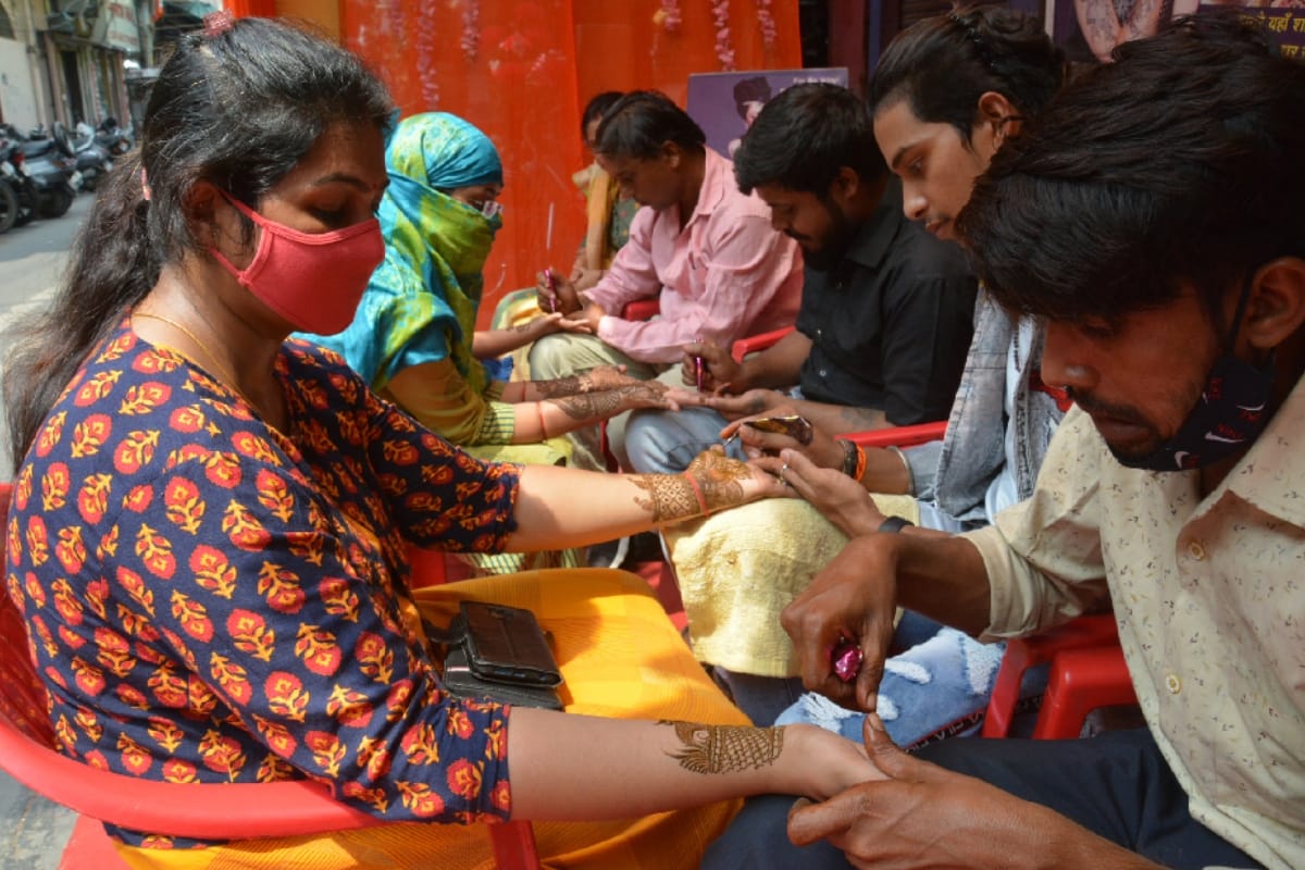 Muslim youths protest against applying Mehndi to Hindu women
