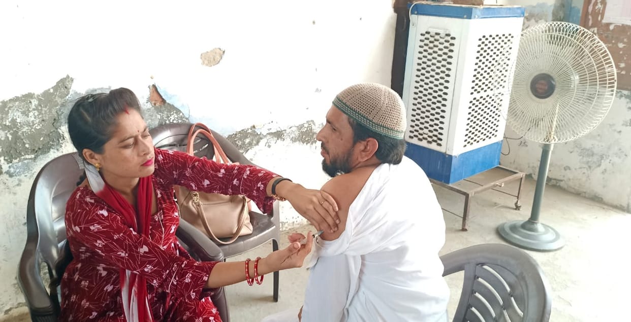 Line in madrasa for vaccine