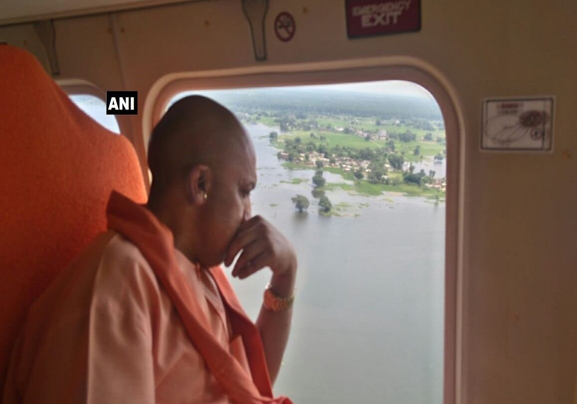 CM Yogi visit flood affected areas will conduct aerial survey distribute relief material in Ghazipur and Ballia