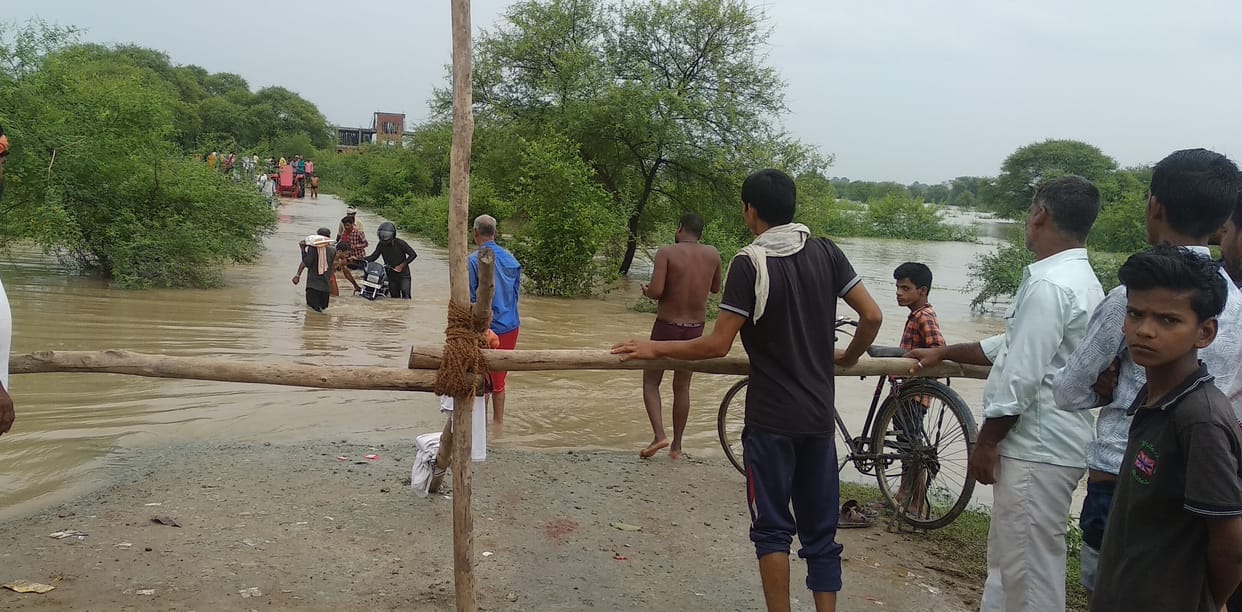 Villages submerged due to floods, abandoned houses and built shelters on high places
