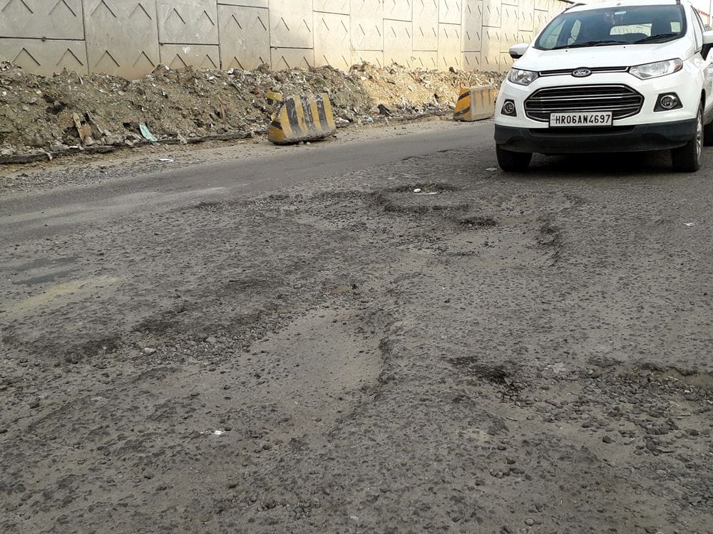 The joke of development is blowing the potholes of the roads in Samalkha