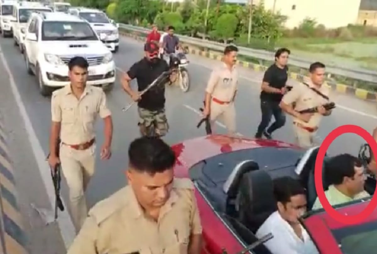 Ghaziabad loni mla nand kishor gurjar sat in Mercedes without number plate in his convoy many stand on car making video