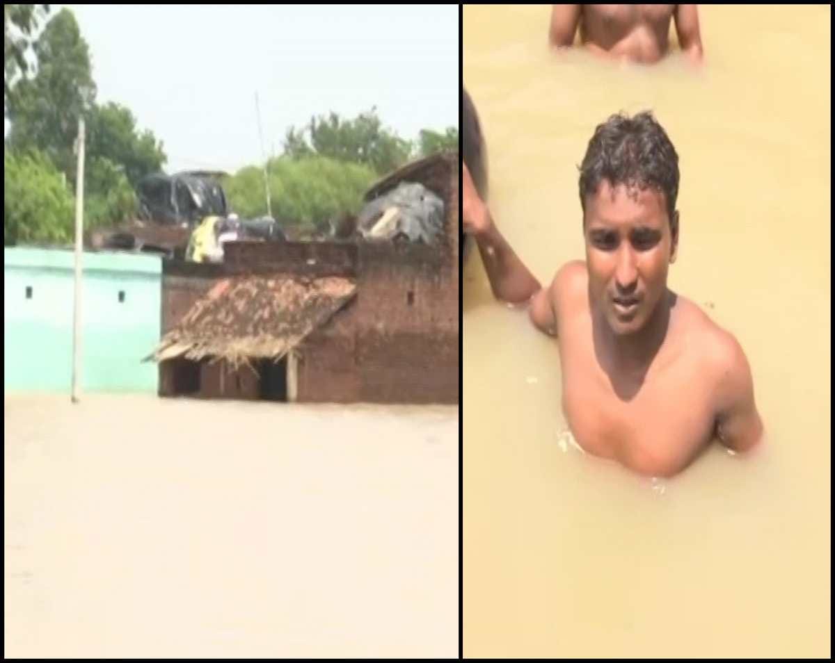 Mirzapur ganga water level decreasing many village still flooded hundreds of families are living on house roofs