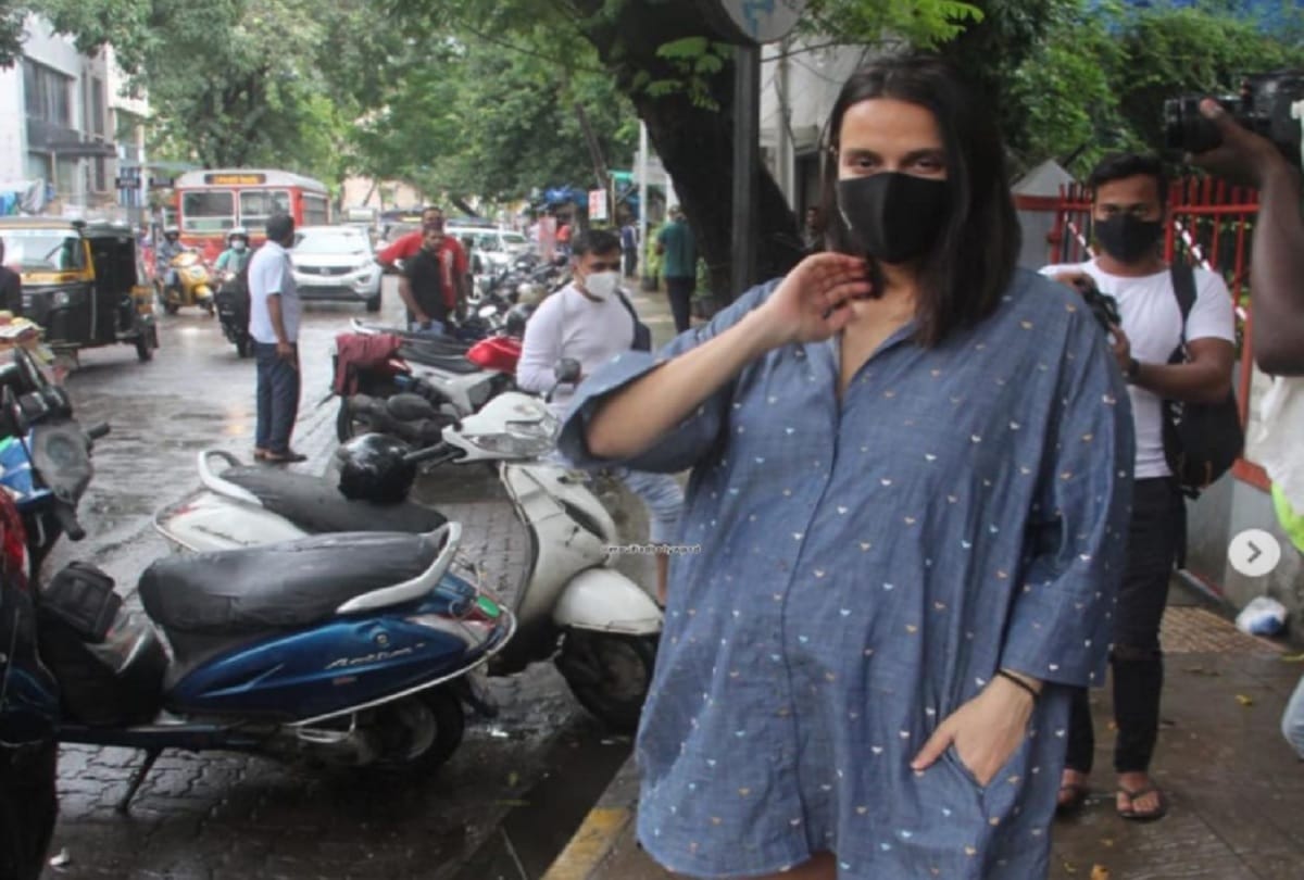 Pregnant Neha Dhupia, Angad Bedi and daughter Mehr spotted outside cafe in Mumbai
