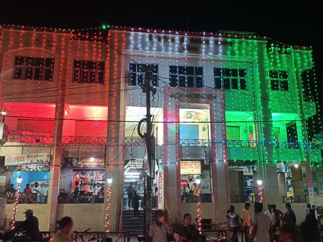 Monuments and buildings lit up with electric lights