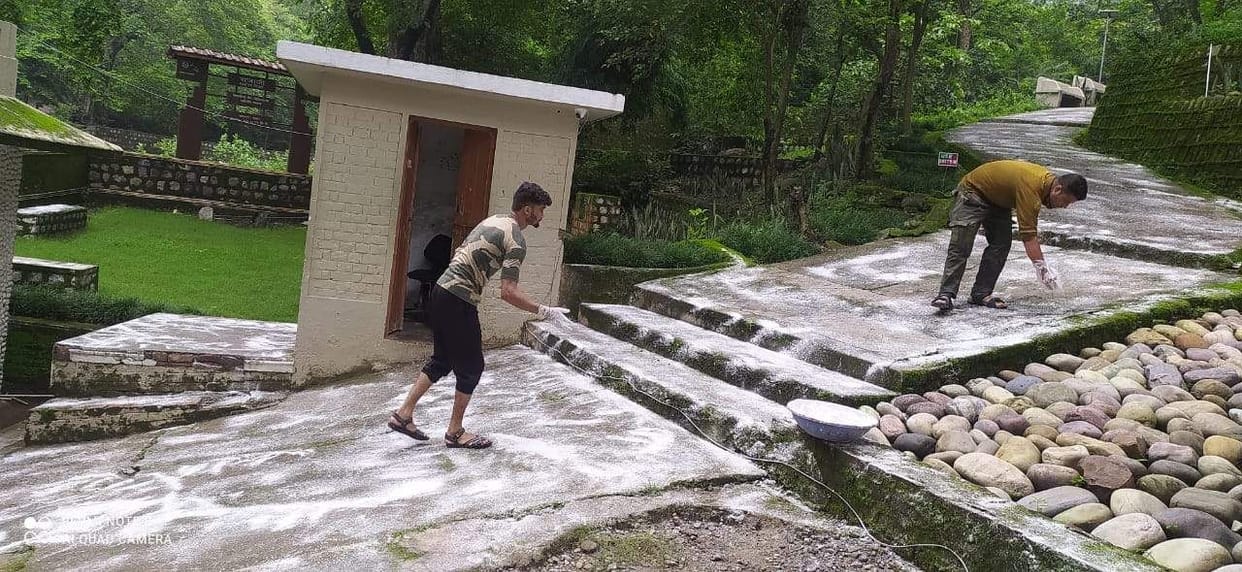 Pak workers engaged in decorating the eighty-four hut