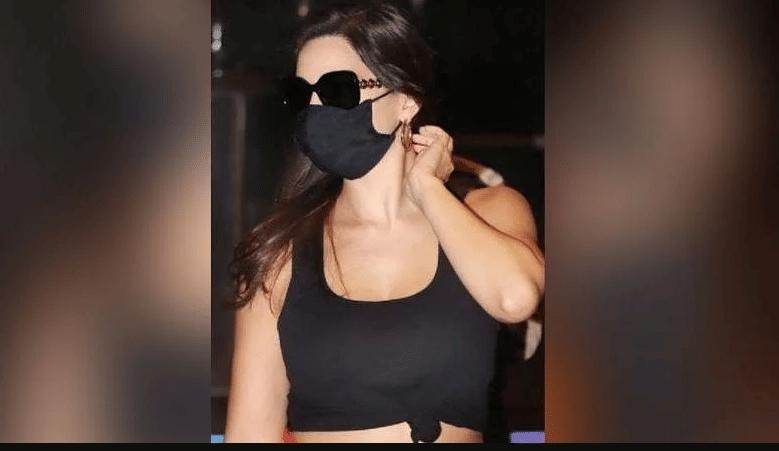 fashion tips see pictures of nora fatehi's airport look and her expensive handbag