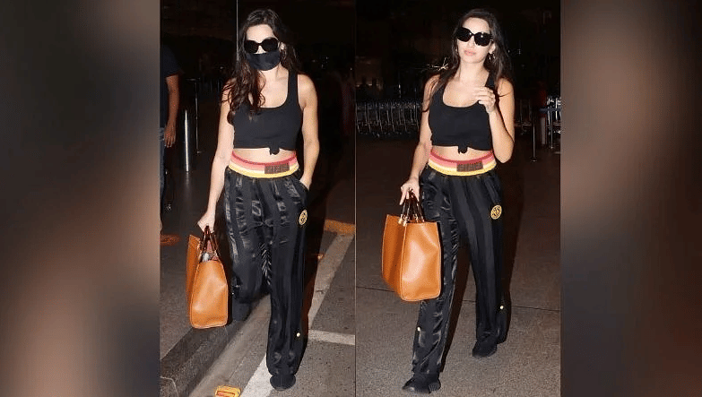 fashion tips see pictures of nora fatehi's airport look and her expensive handbag
