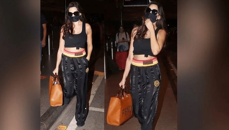 fashion tips see pictures of nora fatehi's airport look and her expensive handbag