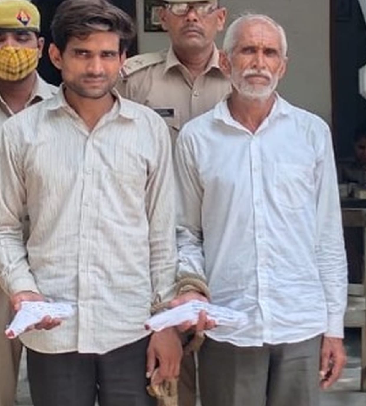 Father and son sent to jail for killing villager