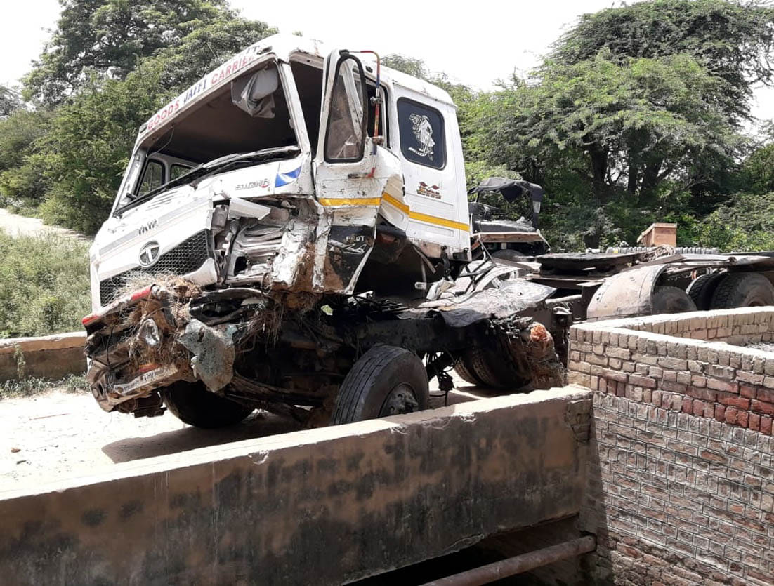 Two trucks collided and fell into the ditch