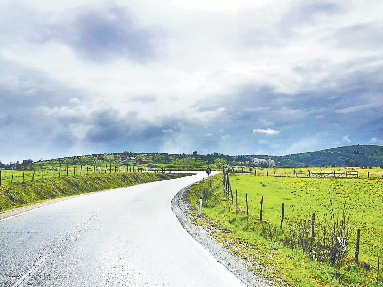 two kilometer road will be four lane