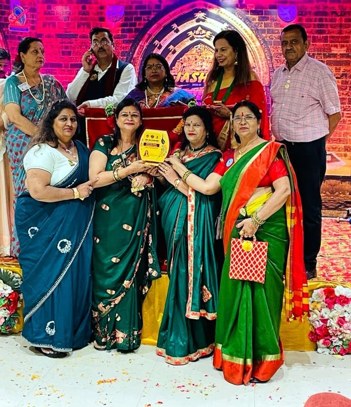 Rashmi honored with Best President Award