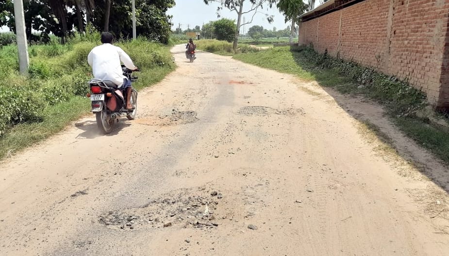 The danger of accidents due to potholes on the main road