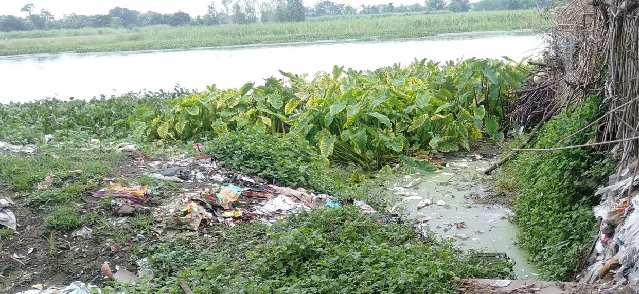Historic crooked river filled with garbage