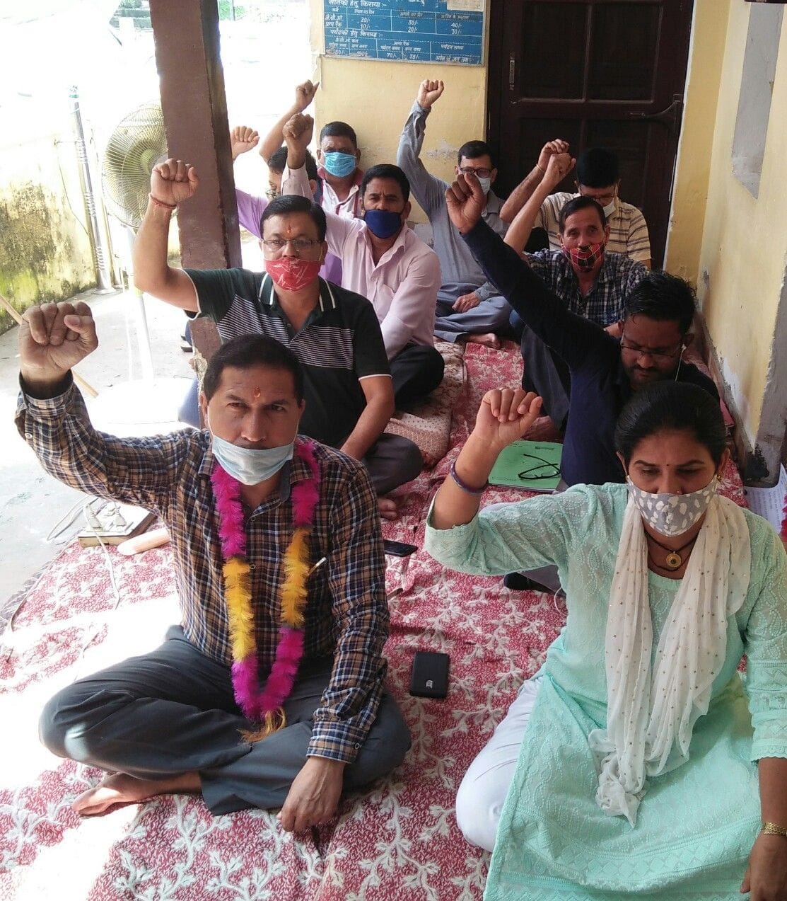 District Sainik Welfare Workers posted on Upanal contract stand on the movement