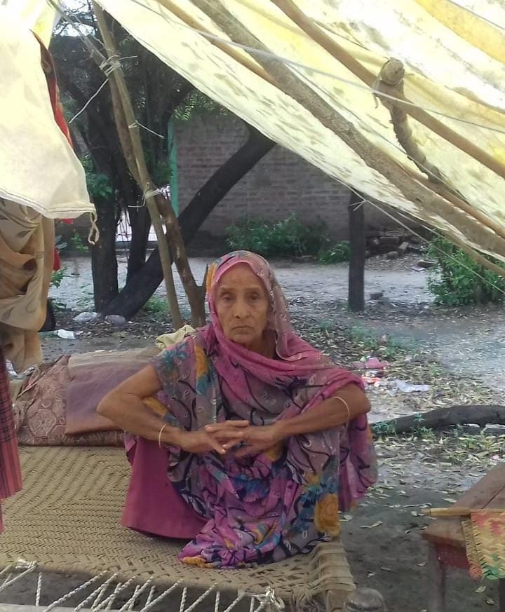 Elderly woman wandering from the absurdity of sons