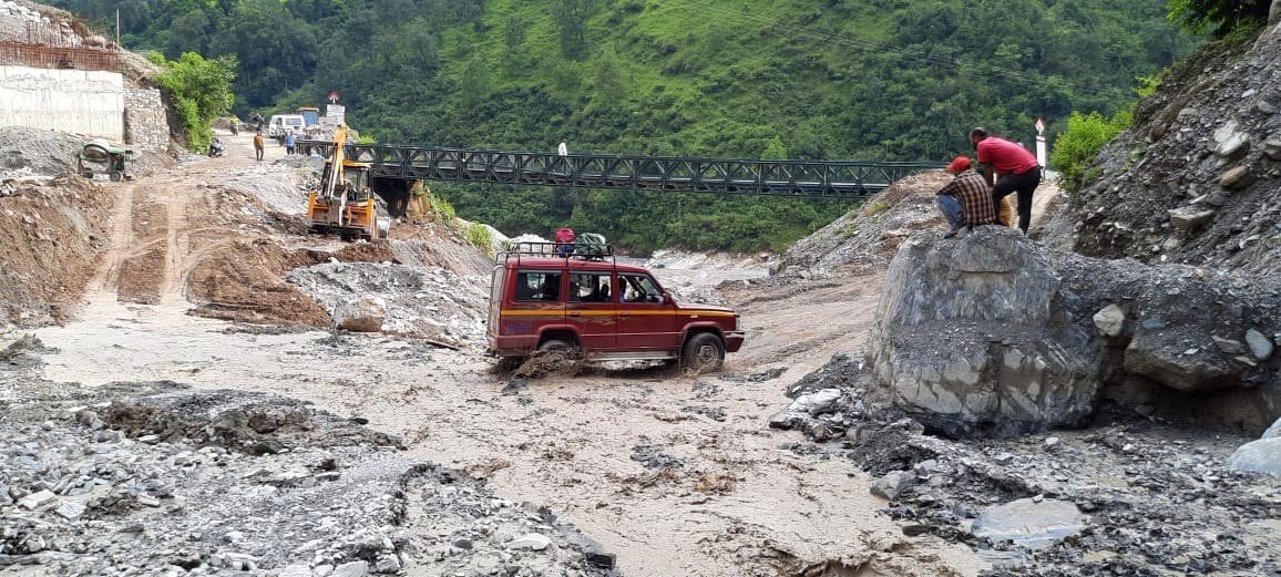 Vehicles will pass through the drain till the bridge is protected