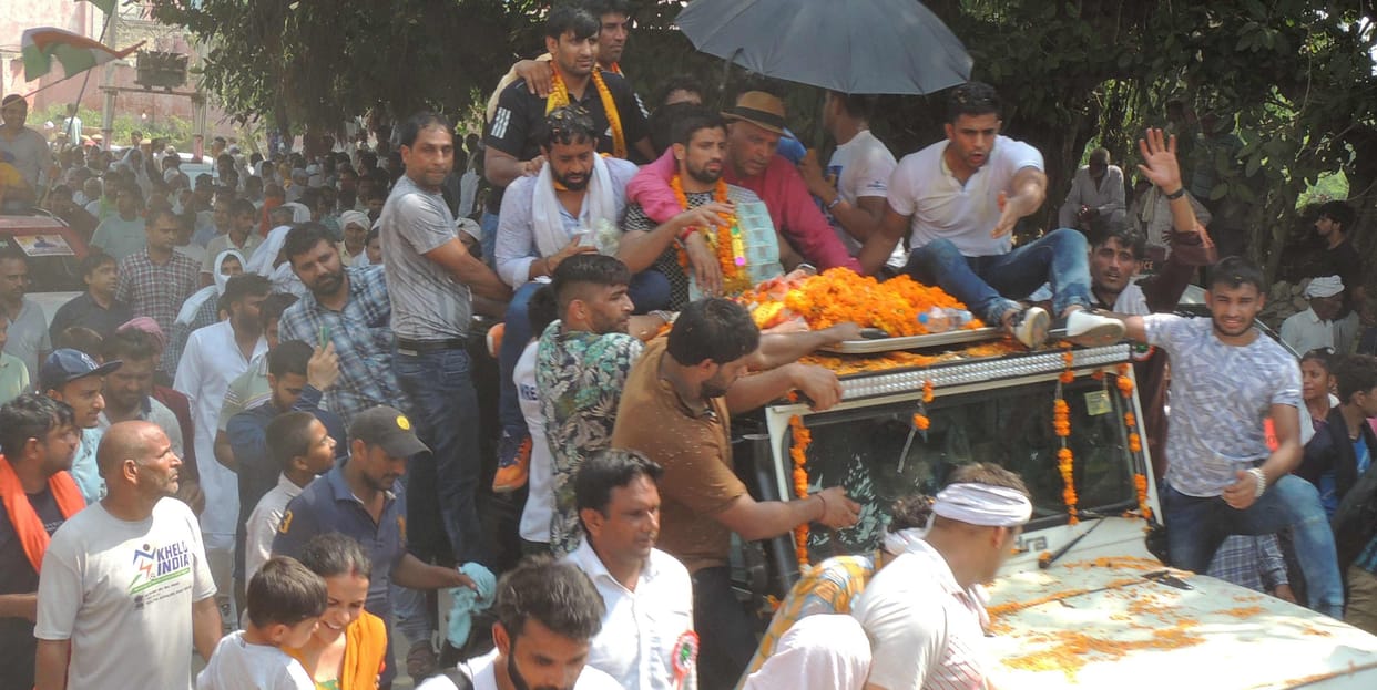 There was a victory procession to welcome Ravi Dahiya, flower showers
