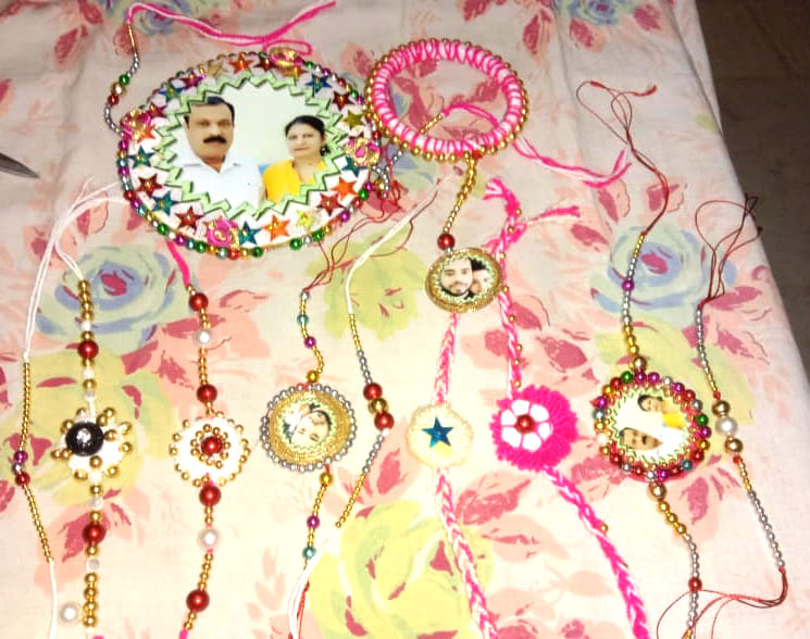 Brother and sister's photo being put on rakhis