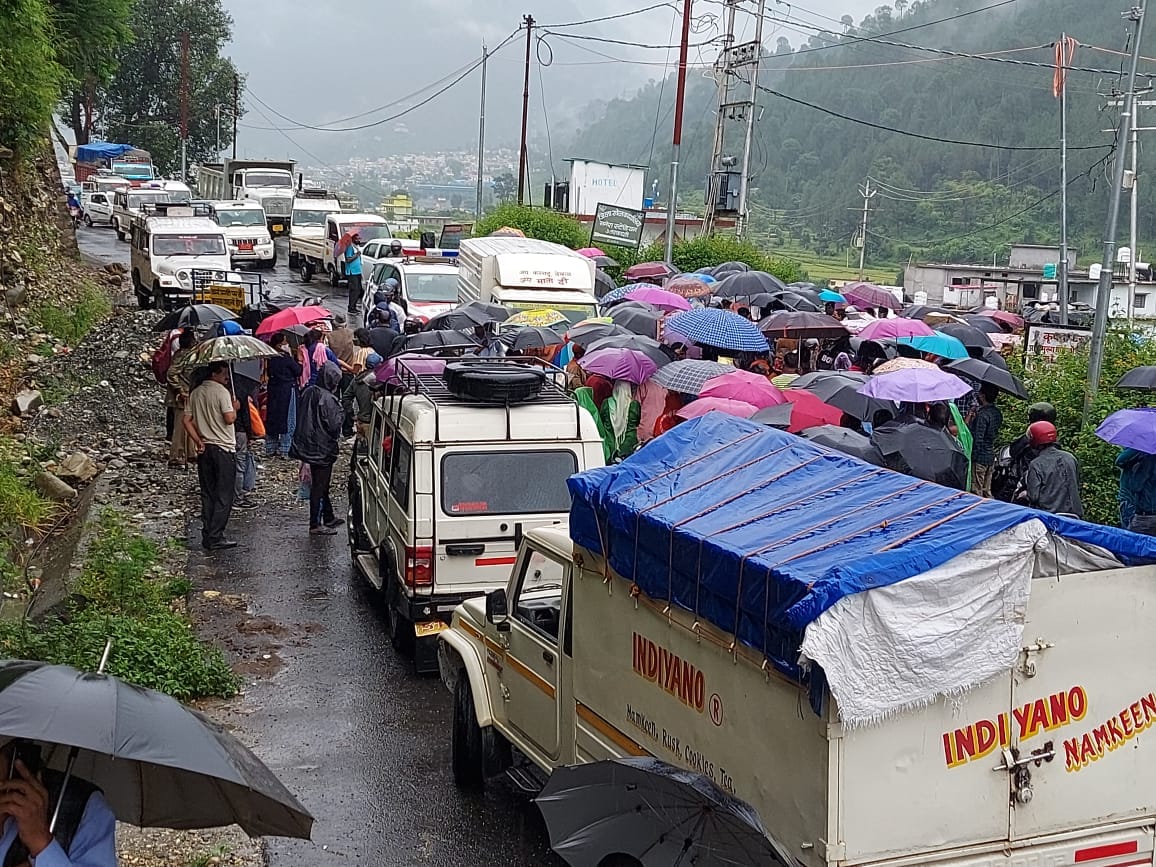 uttarakhand news: road, drinking water line and irrigation canal damaged during all weather road construction, villagers jam road