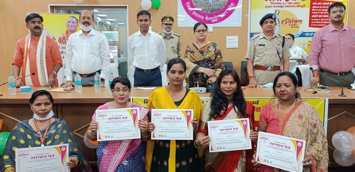 Handing over citations to 75 women who have done excellent work